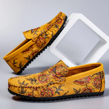 Loafers i läder med blomdetalj