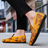 Loafers i läder med blomdetalj