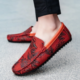 Loafers i läder med blomdetalj