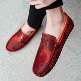 Loafers i läder med blomdetalj
