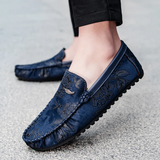Loafers i läder med blomdetalj