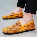 Loafers i läder med blomdetalj
