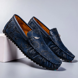Loafers i läder med blomdetalj