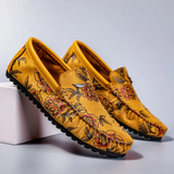 Loafers i läder med blomdetalj