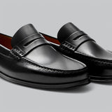 Eleganta penny loafers i läder