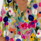 Sidsel | Blommig blus med V-ringning