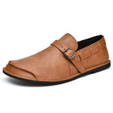 Loafers i spänt läder