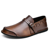 Loafers i spänt läder